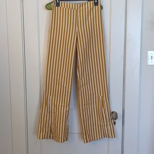 Molly green pull on off white yellow front slit flares